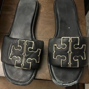 Tory Burch Black Sandals with Gold Accents